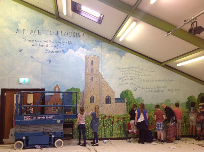 Our beautiful hall mural created by the children